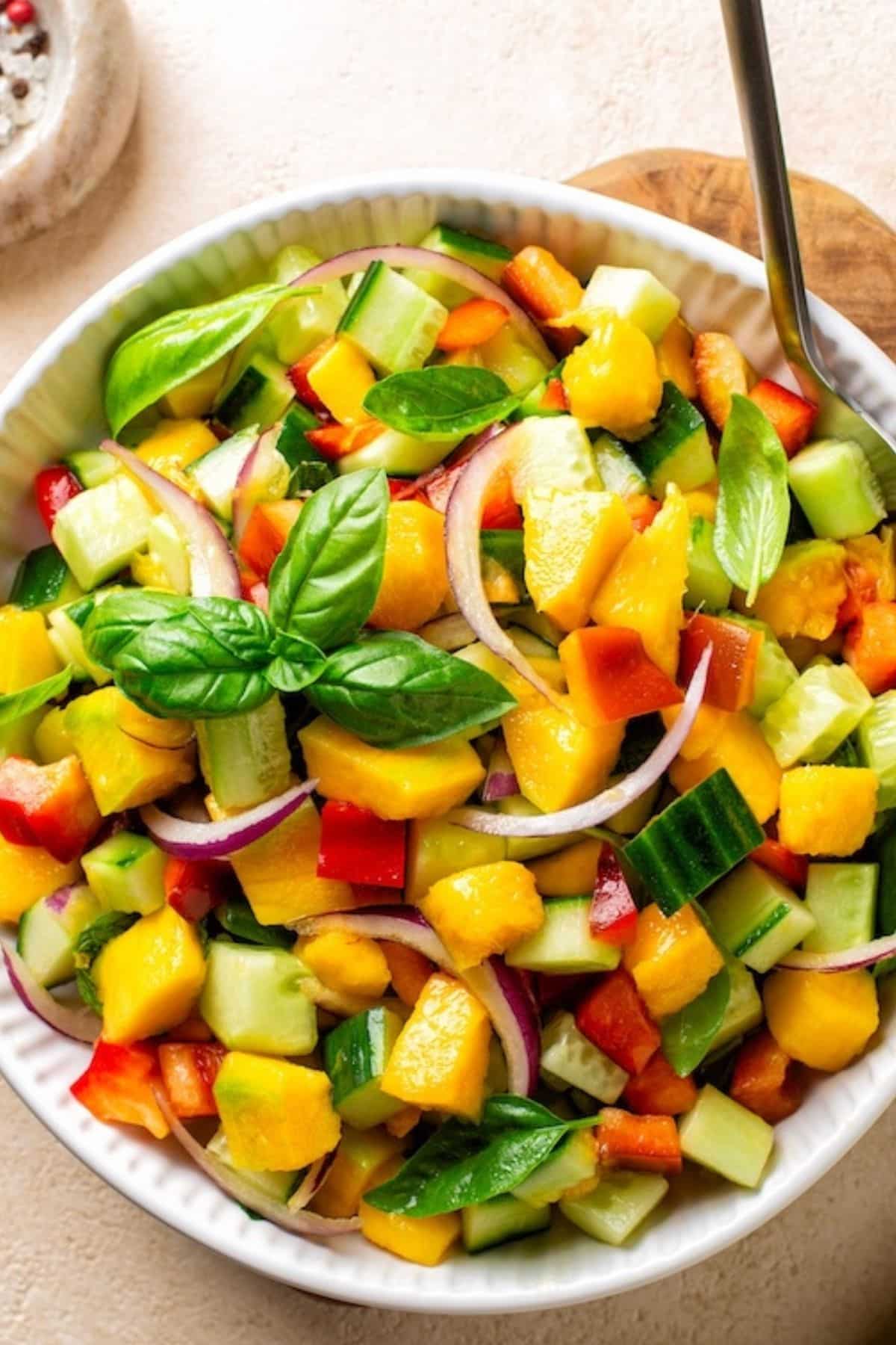 best gluten free summer salads - 1-Bell Pepper Cucumber Salad-bowl-of-salad-with-cucumber-mango-and-bell-pepper